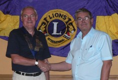 Lion Jim Mathers hands over to our new President Lion Martin Conlon