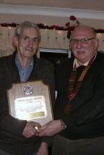 Lion Eric receives his MJF from DG Lion Martin Bye