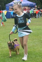 Delilah puts her dog Napoleon through its paces