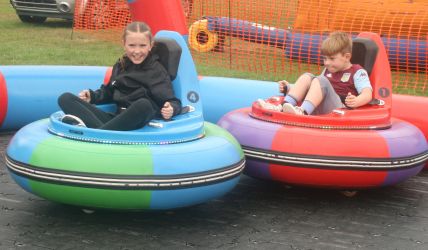 Hector and Mathilda Roach on the bumper cars 